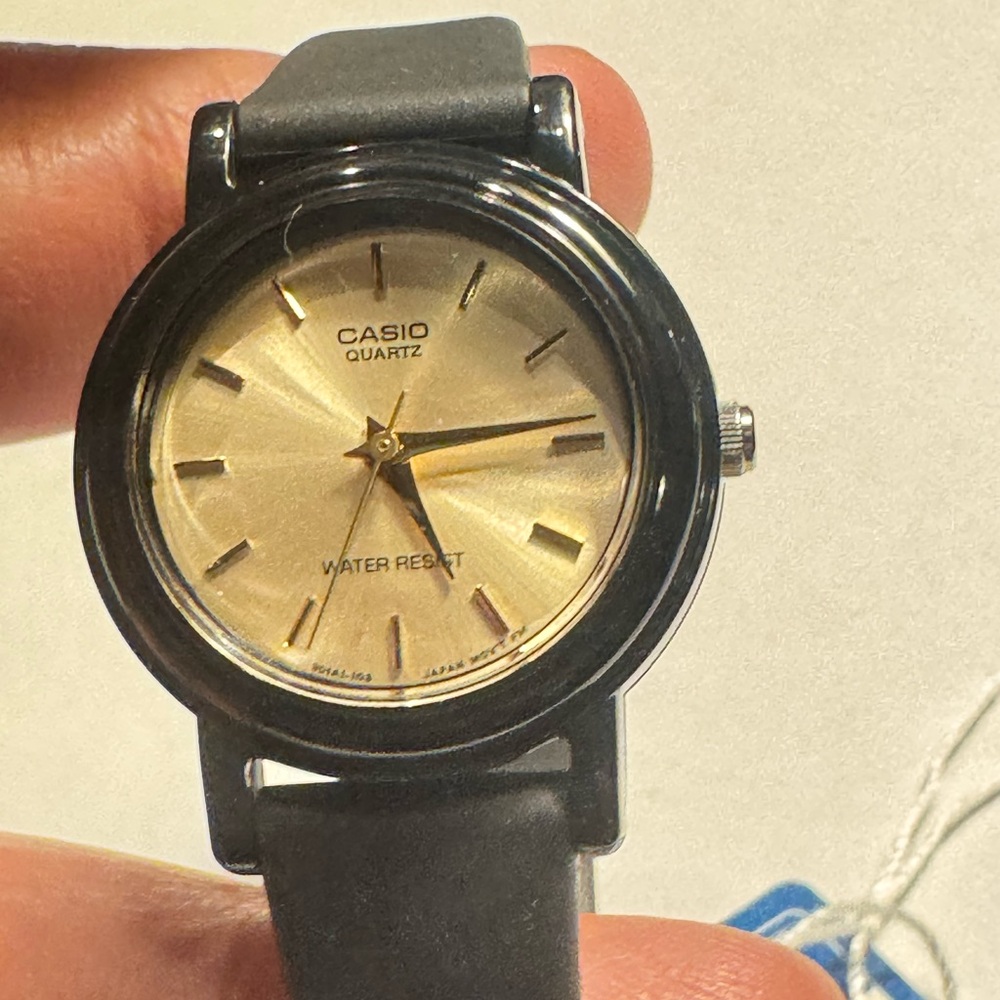 Casio Quartz Black and Gold Watch
